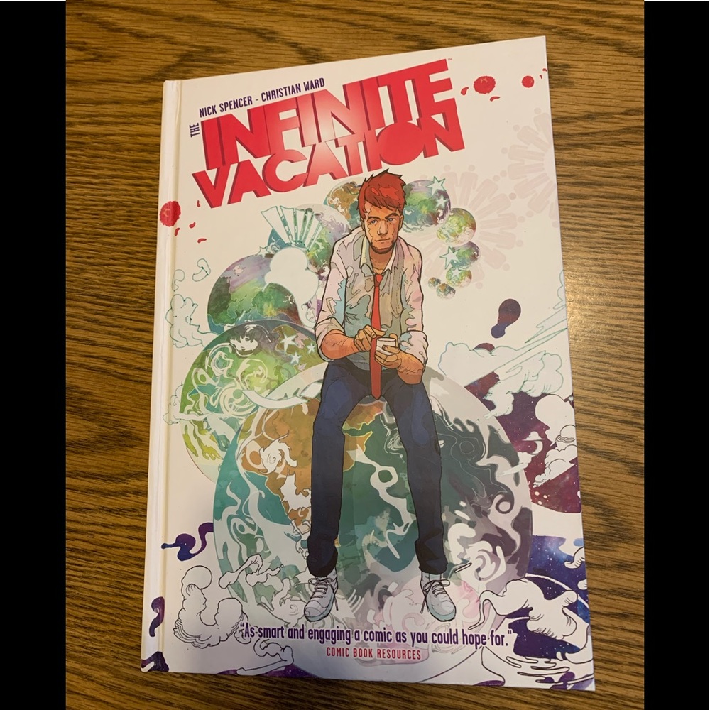 INFINATE VACATION hardcover COMIC BOOK in plastic